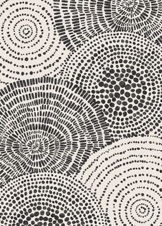 an abstract black and white pattern with circles