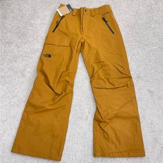 Size : S Inseam 28” Total Long 41” Standard Fit , Dryvent Ski Pants This Fabric Is Fully Waterproof, Windproof And Breathable. Orange Bottoms With Pockets For Outdoor, Waterproof Casual Skiing Pants, Functional Skiing Pants With Pockets, Functional Snowboarding Bottoms With Pockets, The North Face Sporty Outdoor Pants, Sporty Snowboarding Pants With Pockets, Ski Season Sports Pants With Pockets, Sports Pants With Pockets For Ski Season, Casual Snowboarding Pants With Pockets