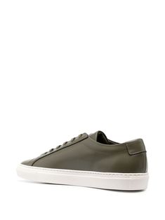 Original Achilles leather sneakers from COMMON PROJECTS featuring olive green, calf leather, smooth grain, signature numbers motif, front lace-up fastening, round toe, branded insole and flat rubber sole. This item is in size 40 and the color is Green Leather Sneakers With Vulcanized Sole, Classic Green Sneakers With Vulcanized Sole, Green Casual Calf Leather Sneakers, Classic Custom Sneakers With Vulcanized Sole And Calf Leather, Green Sneakers With Contrast Sole In Calf Leather, Green Calf Leather Sneakers With Contrast Sole, Classic Green Sneakers With Textured Sole, Green Leather Custom Sneakers With Vulcanized Sole, Green Calf Leather Sneakers With Round Toe