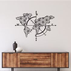 a wall decal with an abstract design in the shape of a compass on it