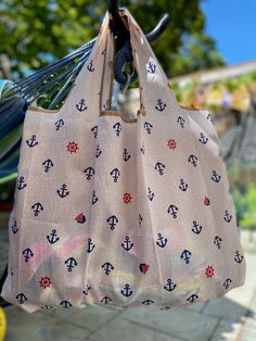 a bag with an anchor pattern hanging from a hook