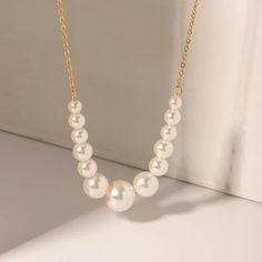 Discover Effortless Elegance with Our Fine Size Pearl Spacer Necklace/Bracelet Indulge in the timeless allure of our Fine Size Pearl Spacer Necklace/Bracelet, meticulously crafted to complement your every ensemble. Elevate your style effortlessly with this exquisite piece, designed to exude sophistication and grace. Featuring a delicate arrangement of lustrous pearls interspersed with gleaming gold-plated stainless steel spacers, this accessory epitomizes refined luxury. The 18k PVD gold plating ensures enduring brilliance, promising a lasting radiance that withstands the test of time. Adorn yourself with confidence, knowing that each piece is meticulously crafted from premium stainless steel, renowned for its durability and resistance to tarnishing. Whether worn as a necklace or bracelet, Pearl Clavicle Chain Jewelry With Round Beads, Pearl Clavicle Chain With Round Beads, Formal Pearl Bracelet Jewelry, Classic Necklaces With Clavicle Chain And Round Beads, Classic Clavicle Chain Necklaces With Round Beads, Classic Clavicle Chain Necklace With Round Beads, Classic Pearl Chain Bracelet Jewelry, Classic Pearl White Jewelry For Party, Elegant Formal Pearl Chain Jewelry