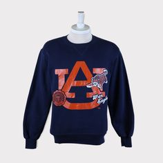 a navy sweatshirt with an auburn logo on it