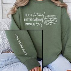 a woman wearing a green sweatshirt with white writing on it