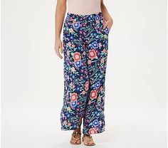 These breezy, wide-leg pants deserve the number one spot in your bag that's packed for the beach. From Cuddl Duds. Fabrication: woven Features: smocked elastic waistband, pockets Rise: slightly below the waist Fit: relaxed fit; generously cut with maximum wearing ease Leg Shape: wide leg; widens fashionably from thigh to leg opening Inseam: missy/plus inseam 29-1/2" Content: 100% rayon Care: machine wash, tumble dry WE WILL BE MORE THAN HAPPY TO OFFER COMBINED SHIPPING DISCOUNTS IF ITEM QUALIFIE Clown Pants, Cuddle Duds, Cool Breeze, Cuddl Duds, Summer Pants, Knit Pants, Cute Pattern, Number One, Smocking