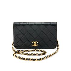 This stylish model is crafted of smooth diamond-quilted lambskin leather in black. The bag features a gold chain leather threaded shoulder strap and a gold Chanel CC logo for the front flap. This opens to a burgundy leather interior with zipper and patch pockets. This bag has an estimated retail of $4,360. Luxury Black Quilted Wallet On Chain, Classic Flap Bag With Chain Strap, Designer Quilted Leather Wallet On Chain, Luxury Quilted Leather Wallet On Chain, Classic Quilted Flap Bag For Evening, Classic Quilted Evening Flap Bag, Quilted Rectangular Wallet On Chain For Formal Occasions, Quilted Rectangular Wallet On Chain For Formal Events, Classic Quilted Shoulder Bag For Everyday Luxury