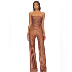 Camila Coelho Callie Jumpsuit In Chocolate Sequins. Brand New With The Tags Still Attached. No Visible Flaws Size Small Beautiful Chocolate Brown Self: 100% Poly Ground With Pet Sequins Lining: 97% Poly 3% Spandex Hand Wash Cold Allover Sequin Embellishment This Is The Strapless Version Hidden Back Zipper Closure Perfect Dress For A Holiday Party, Fall Wedding, Black Tie, Cocktail, New Year’s Eve Length: 47” Inseam 31.5 Inches, Hips 20 Inches, Bust 15.5 Inches Reformation Anthropologie Zara Lna Fitted Sequin Jumpsuits And Rompers For Cocktail, Fitted Sequin Jumpsuit For Cocktail, Formal Fitted Strapless Jumpsuit For Party Season, Sequin Strapless Fitted Jumpsuit For Party, Fitted Strapless Sequin Jumpsuit For Party, Strapless Fitted Jumpsuits And Rompers For Gala, Fitted Jumpsuits And Rompers For Cocktail Parties, Glamorous Fitted Strapless Jumpsuit For Gala, Glamorous Strapless Jumpsuit For Gala