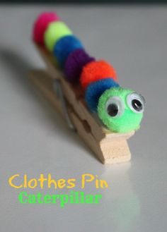 a craft project for kids to make a colorful caterpillar pin toy with googly eyes