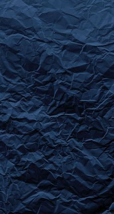 an image of blue crumpled paper background