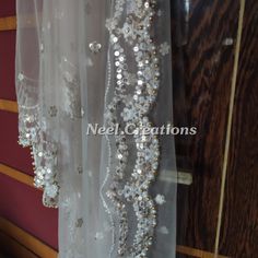 Beautiful embroidered dupatta with scallop border. Perfect for your wedding veil. It is very rich and classy dupatta. More dupatta here in our collection https://www.etsy.com/shop/neelcreations/?section_id=15880219 This Bridal Dupatta is embroidered on net with beautiful Scallop border. This can be your wedding dress chunni for Indian occasion wear for festival. This has perfect bling for you to look classy and ethnic at same time. NOTE : There might be slight color variation due to different co Silver Organza Dupatta For Reception, Silver Dupatta With Resham Embroidery In Georgette, Unstitched Dupatta With Intricate Embroidery For Wedding, Silver Georgette Dupatta With Resham Embroidery, Wedding Unstitched Organza Dupatta, Wedding Organza Dupatta Unstitched, Sheer Organza Dupatta For Reception, Wedding Organza Dupatta, Semi-stitched Silver Organza Dupatta