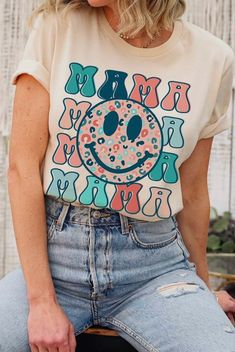 Colorful mama smiley face shirt.  Short sleeve, crew neck.  Perfect for Mother's Day or every day wear. Smiley Shirt, Smiley Face Shirt, Womens Graphic Tees, Shirt Short Sleeve, Mama Shirt, Graphic Tees Women, Smiley Face, Cute Shirts, Womens Clothing Tops