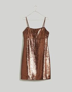 Sequin Slip Mini Dress Sequin Mini Dress With Straight Neckline For Night Out, Glamorous Mini Dress With Sequins And Straight Neckline, Sequin Spaghetti Strap Mini Dress For Holiday Party, Glamorous Mini Dress With Adjustable Straps For Night Out, Glamorous Mini Dress With Spaghetti Straps For Holiday Party, Holiday Party Mini Dress With Sequins And Spaghetti Straps, Holiday Mini Dress With Sequins And Spaghetti Straps, Sequined Mini Dress With Spaghetti Straps For Date Night, Chic Sequined Mini Dress With Straight Neckline