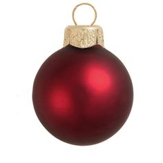 a red christmas ornament hanging on a white background