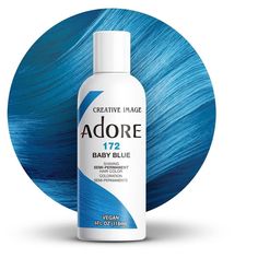 Pack of 1 Adore Hair Color - please verify color name in the Product Title Transform your hair with the vibrant and long-lasting hues of Creative Image Adore Semi-Permanent Hair Color. This innovative hair dye is designed to infuse each strand with rich, radiant color while maintaining the health and integrity of your hair. Free from harsh chemicals like ammonia, peroxide, and alcohol, Adore provides a gentle yet effective coloring experience that leaves your hair feeling soft, silky, and full of life. Adore’s unique formula is enriched with natural ingredients that nourish and condition your hair, ensuring that it remains healthy and vibrant. The semi-permanent nature of the dye means that it gradually fades over time, allowing you to experiment with different shades without the long-term Blue Adore Hair Dye, Color To Dye Hair, Light Blue Hair Color, Adore Hair Color, Adore Hair Dye, Good Dye Young, Hair Dye Brush, Punky Color, Joico Color