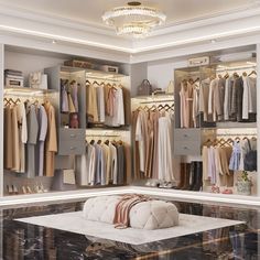 a walk in closet filled with lots of clothes