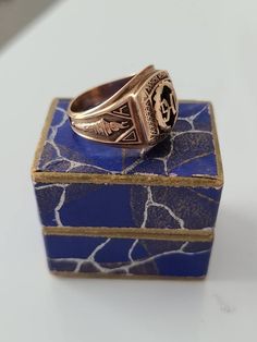 Vintage, Balfour, 1940, ladies 10K yellow gold class ring. Flame holder motif on both sides of band, and set with a square black onyx stone. Comes with original ring box. Size: 6.5 Crown area measures approx. 14.2mm x 12mm Hallmarks: 10K, Balfour Condition: Good, but expect age related wear Classic Rectangular Signet Ring Collectible, Classic Rectangular Collectible Signet Ring, 14k Gold Signet Ring With Maker's Mark As Gift, 14k Gold Engraved Ring With Maker's Mark As Gift, Formal 14k Gold Engraved Ring With Maker's Mark, Victorian Signet Ring With Maker's Mark, Victorian Signet Ring With Maker's Mark As Gift, Vintage Formal Initial Ring Hallmarked, Victorian Rings With Maker's Mark As A Gift