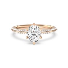 a rose cut diamond engagement ring with pave set diamonds on the band and side stones