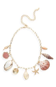 Beautiful shells and shimmering beach charms dangle from a chain-link necklace that brings a touch of seaworthy, vacation-ready style to your look. 14" length; 5" extender Lobster clasp closure 18k-gold plate/shell/glass/imitation pearl Imported Ocean-inspired Jewelry With Lobster Clasp For Vacation, Ocean-inspired Starfish Charm Necklace For Vacation, Ocean-inspired Jewelry For Vacation With Lobster Clasp, Vacation Ocean-inspired Starfish Charm Necklace, Gold Necklace With Starfish Charm For Beach Season, Gold Starfish Charm Necklace For Beach Season, Beach Shell Charm Necklace With Pearl, Shell Charm Necklaces For Beach, Beach Pearl Charm Necklaces With Shell