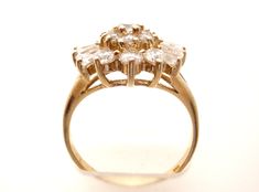 Fine Vermeil Jewellery - This is a gold over sterling silver cluster style cocktail ring with clear round and baguette cz's. The ring is a size 9, hallmarked 925, has approximately 3 carats of cubic zirconias, face measures 14mm by 16mm, weighs 4.2 grams. Vermeil Jewelry, 3 Carat, The Ring, Cocktail Ring, Cocktail Rings, Baguette, Cubic Zirconia, Engagement Rings, Sterling Silver