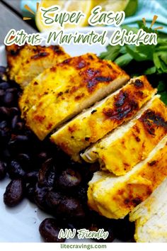 grilled chicken breast with black beans on a white plate and text overlay reads super easy citrus marinated chicken