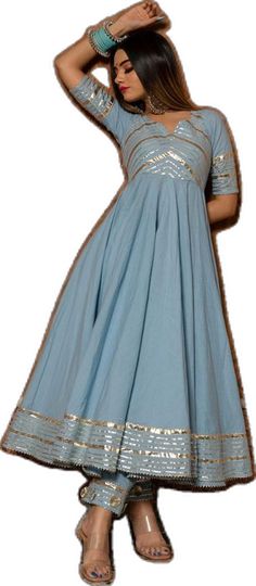 Blue Churidar With Mirror Work For Reception, Blue Cotton Anarkali Set With Gota Work, Blue Churidar With Gota Work For Party, Blue Cotton Lehenga For Wedding, Cotton Anarkali Set With Mirror Work For Wedding, Cotton Anarkali Set With Resham Embroidery For Party, Cotton Anarkali Set For Navratri Party, Bollywood Cotton Anarkali Set For Party, Blue Churidar With Chikankari Embroidery For Party