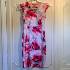 Calvin Klein Floral Dress. Size 2. Nwot. Tried On But Never Worn. Absolutely Stunning And Pictures Do Not Do It Justice. Light Grey/Taupe Background With Vibrant Pink And White Floral Pattern. Perfect To Dress Up Or Down! Great Year Round Fabric! Feminine Fitted Sleeveless Dress With Floral Print, Feminine Fitted Sleeveless Pink Dress, Elegant Pink Floral Print Sleeveless Dress, Elegant Pink Sleeveless Dress With Floral Print, Pink Fitted Sleeveless Dress, Chic Pink Sleeveless Dress With Floral Print, Calvin Klein Sheath Summer Dress, Pink Sleeveless Floral Print Dress, Calvin Klein Summer Sheath Dress