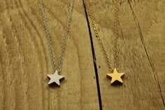 Floating star necklace.  This pretty star necklace features a stainless steel star pendant on a stainless steel cable chain. The necklace is available in a choice of silver or gold finish. Measurements: Star charm: 10 x 10mm Chain length: 44cm How's it packed? Your item will be packaged in a purple organza bag. Your order will then be shipped in a padded envelope. Floating star necklace, silver star necklace, silver star pendant necklace, celestial necklace, silver star jewellery, star charm necklace, star gift, gold star necklace, gold star pendant, gold star jewellery Star-shaped Stainless Steel Necklace For Gift, Stainless Steel Star Charm Necklace, Star Jewellery, Silver Star Necklace, Gold Star Pendant, Star Necklace Silver, Star Necklace Gold, Star Charm Necklace, Pretty Star