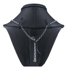 the back of a black corset with chains attached to it's sides