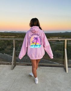 Stay cozy with this warm sunset hoodie this summer! This will be the one you reach for on those windy mornings or nights.  ➡️  DESIGN IS PRINTED ON BACK OF HOODIE. THE FONT IS BLANK  ⬅️ 🤩 TIP: These run true to size. If you want an oversized look, size up 2-3 sizes. 😉 ✅ Information: ★ Gildan Unisex Hoodie ★ -50% Cotton 50% Polyester -Medium-heavy fabric -Classic fit -Tear away label -Runs true to size ✅Design Printing Design printed using Direct to Garment (DTG) print technology. ✅ Care Instru Pink Long Sleeve Hoodie For Outdoor Activities, Pink Cotton Hoodie For Outdoor, Spring Outdoor Hoodie With Kangaroo Pocket, Pink Hoodie With Drawstring For Outdoor Activities, Comfortable Hooded Hoodie For Outdoor, Casual Pink Hoodie For Outdoor Activities, Casual Pink Beach Sweatshirt, Casual Pink Sweatshirt For Outdoor, Casual Pink Sweatshirt For Outdoor Activities