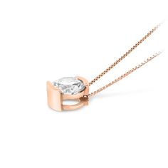 Modern and sophisticated, this necklace is a captivating look any woman would adore. Beautifully crafted, this ring features a dazzling 1.70 carat center stone placed prominently in a 18K rose gold half-bezel setting that enhances the diamond's size and sparkle.  This classic look is one she'll turn to often, everyday and on special occasions. An amazing and thoughtful anniversary gift for your loved one.
purchase1.70 carat round cut I VS2 
18k rose gold
We offer a Free Minimalist Rose Gold Round Diamond Necklace, Elegant White Solitaire Necklace With Tension Setting, Rose Gold Diamond Necklace With Bezel Setting, Rose Gold Diamond Necklace With Single Round Cut, Rose Gold Round Cut Diamond Necklace With Bezel Setting, Timeless Rose Gold Diamond Necklace With Round Cut, Modern Rose Gold Diamond Necklace For Anniversary, Rose Gold Diamond Necklace With Round Cut, Timeless Rose Gold Diamond Necklace