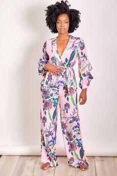 Matchy Matchy. You'll love matching in this gorgeous two piece set with a gorgeous pastel color in a fun floral print. The long sleeve top is kimono style with a self-tie belt and gathering at the sleeves. The wide-leg, high waisted pants are a perfect finish to a perfect 'fit CONTENT & CARE Hand wash with cold water Polyester DEETS & FIT Model is wearing a size Medium Fabric has a little stretch Model profile: Grace is 5'8.5" and measures 34 (bust) 27 (waist) and 42 (hips) Flowery Tops, Model Profile, Business Professional Outfits, Trendy Suits, Kimono Maxi Dress, Floral Two Piece, Model Profiles, Dress Appropriately, Kimono Style