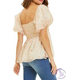 Indulge in romance with our floral puff-sleeved blouse. The square neck and smocked back add a flirty touch to this babydoll top. Perfect for date night or a day out with friends, it's the ideal combination of sweet and stylish. Material: 100% Polyester Feminine Flowy Smocked Top With Floral Print, Spring Smocked Top With Puff Sleeves And Gathered Neckline, Spring Square Neck Puff Sleeve Top With Smocked Back, Flowy Puff Sleeve Blouse With Smocked Bodice, Flowy Blouse With Smocked Bodice And Puff Sleeves, Trendy Puff Sleeve Top With Ruffles And Square Neck, Feminine Square Neck Top For Brunch, Trendy Square Neck Blouse For Brunch, Chic Floral Print Smocked Top For Day Out