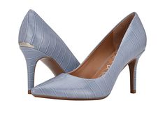 Calvin Klein Gayle 2 - Women's Shoes : Light Blue : The Calvin Klein Gayle 2 is a modern and uniquely sophisticated heel that offers timeless style. Slip on style in a pointed toe silhouette. Classic stiletto heel. Flexible for extended wear, with signature gel pod inserts for comfort and support. A slip-resistant and weather proof sole provides shock absorption with every step. Finished with a branding plate at back heel. Upper, lining, insole, and outsole made of man-made material. Imported. M Calvin Klein Heels With Padded Heel For Work, Calvin Klein Almond Toe Heels For Work, Modern Calvin Klein Leather Heels, Modern Fitted 4-inch Heels, Fitted Slip-on Synthetic Court Shoes, Calvin Klein Heels For Office, Chic Fitted Court Shoes With Removable Insole, Modern Fitted Court Shoes With Sculpted Heel, Calvin Klein Formal Heels For Spring