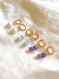 Handmade huggie hoop crystal earrings. Delicately crafted gemstone earrings to complement any outfit. Makes the perfect gift for that special someone  - ☾ AMETHYST ☽ ᠃ ⚘᠂ ⚘ ˚ ⚘ ᠂ ⚘ ᠃ ABOUT THE STONE: Amethyst is good for Stress Relief, Balance, and Protection. Its element is Water. ADDITIONAL INFO:  Country of Origin:  Amethyst is from Brazil.  AMETHYST CRYSTAL CARE TIPS: - The best way to clean amethyst crystals is to dip them in warm, sudsy water. - Avoid leaving amethyst in the sun too long, Elegant Hoop Earrings With Natural Stones For Gift, Elegant Natural Stone Hoop Earrings For Gift, Handmade Gold Plated Dangle Huggie Earrings, Adjustable Gemstone Hoop Earrings As Gift, Adjustable Gemstone Hoop Earrings For Gift, Gemstone Dangle Huggie Earrings Gift, Gemstone Hoop Earrings As A Gift, Dainty Gemstone Huggie Earrings For Gift, Handmade Gold-plated Huggie Earrings