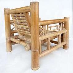 a wooden bed frame made out of bamboo