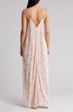 For slimming style and a flattering fit, this maxi slipdress is an easy winner in the wardrobe game. 59" length (size Small/Medium) Slips on over head V-neck Adjustable straps 50% rayon, 50% viscose Dry clean Imported Pink V-neck Dress With Side Slits, Pink V-neck Maxi Dress For Loungewear, Feminine Viscose Maxi Dress For Day Out, Maxi Length Sundress Slip Dress For Brunch, Sundress Style Maxi Length Slip Dress For Brunch, Flowy Maxi Dress Unlined, Unlined Flowy Maxi Dress, Daywear Viscose V-neck Slip Dress, Viscose Sundress Maxi Dress For Daywear