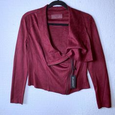 Blank Nyc Nwt Womens Size Xs Burgundy Faux Suede Asymmetrical Zip Moto Jacket Blank Nyc Jacket Size: Xs Color: Burgundy Design: Suede Moto Neckline: Asymmetrical Zip Sleeves: Long Sleeves Style 76x-9020n0 Materials: 90% Polyester, 10% Spandex Measurements (Approximate) In Inches. Items Are Measured Laying Flat & Not Stretched. Length: 21 Underarm To Underarm: 18 Condition: New With Tags. All Items Come From A Smoke Free Home. Please Message Me With Any Other Questions! Fitted Fall Outerwear With Side Zipper, Fitted Outerwear With Side Zipper For Fall, Fitted Casual Outerwear With Side Zipper, Fall Tops With Asymmetrical Zipper Closure, Fitted Burgundy Biker Jacket For Winter, Chic Fitted Burgundy Biker Jacket, Fitted Burgundy Biker Jacket For Fall, Trendy Fitted Asymmetrical Outerwear, Trendy Fitted Outerwear With Side Zipper