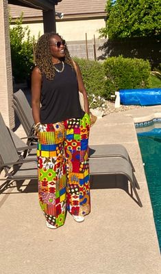 New loose African print pants, wide-leg made from African prints 100% cotton with no stretch. Our Ankara pants for women are very versatile, easy to wear, and comfy style. These African wax pants will be made loose fit for you upon ordering.   Features hidden side pockets. *Listing is for pants ONLY* Click below for the matching top:  https://www.etsy.com/listing/1322210044/mani-linen-kimono-linen-kimono-robe?click_key=6d282701f5fcd54db69a73a37cc3fa815256bb5b%3A1322210044&click_sum=16d87e3d&ref=shop_home_active_6&frs=1&sts=1 MEASUREMENT GUIDE:  For your best fit please provide: Waist measurements=Measure around your natural waist. Hip measurements= Inseam=Take your inseam by measuring between your crotch and hem. Your Height= - [ ] Orders; Once your order is placed with us, you will receiv Baggy Multicolor Wide-leg Pants, Baggy Wide Leg Multicolor Pants, Multicolor Wide-leg Pants With Elastic Waistband, Casual Multicolor Wide Leg Pants, Multicolor Ankle-length Wide Leg Pants With Elastic Waistband, Casual Multicolor Wide-leg Harem Pants, Multicolor High-waisted Cotton Pants, Cotton Printed Pants For Vacation, Casual Wide Leg Printed Pants