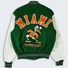 Miami Hurricanes Vintage 70s Butwin Varsity Jacket  University College Green Bomber Coat Stitched On Logos & Letters Made in USA In Excellent Vintage Condition No Holes or Stains Size Fits Like A Men's : Medium ( M ) PLEASE CHECK YOUR MEASUREMENTS Length: 26 in Pit to Pit: 22 in FREE AND FAST SHIPPING IN THE USA White Varsity Jacket, Senior Jackets, Mens Leather Coats, Biker Jacket Men, Movies Outfit, University College, Brown Leather Jacket, Leather Sleeve, Mens Vest