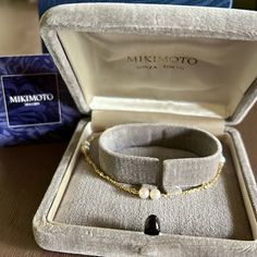 Mikimoto Simple 18k Pearl Bracelet Chain Breathtaking Simple Gold Chain Mikimoto Bracelet Marked 18k And M Shell Mark Elegant, Classy, Lustrous Pearls At About 4.5mm Length Is 6.57 In, You Can Easily Add Extenders. 2.4g Excellent Unworn Condition, Shines So Beautifully. Comes With Original Box And Outer Box And Card. Blue Box Has A Rip And Gray Box Sometimes Pops Open On Its Own. Bracelet Is Undamaged. Selling Out Soon! Pet Smoke Free Shop Yellow Gold Plated Jubilee Pearl Bracelet, Gold-plated Yellow Gold Pearl Bracelet Gift, Gold Plated Yellow Gold Pearl Bracelet Gift, Yellow Gold Plated Pearl Bracelet Gift, Modern Gold Pearl Bracelet As Gift, Modern Yellow Gold Pearl Bracelet As Gift, Modern Yellow Gold Pearl Bracelet For Gift, Modern Yellow Gold Pearl Bracelet Gift, Modern Yellow Gold Pearl Bracelet