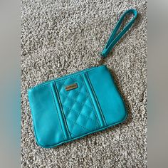 Nwot Turquoise Wristlet. Never Used. From Smoke And Pet Free Home. Blue Wristlet With Zipper Pouch For Daily Use, Blue Zipper Pouch Wristlet, Everyday Blue Pouch Wristlet, Blue Bags With Wrist Strap For Daily Use, Blue Wristlet With Zipper Pouch For Travel, Blue Clutch Wristlet For Travel, Blue Rectangular Wristlet For Everyday Use, Trendy Blue Everyday Wristlet, Blue Rectangular Bag With Wrist Strap