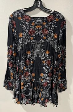 Free People Smooth Talker Tunic Mini Dress Size Small Pullover Open Back. Black with floral pattern and pockets. Dress is short and can be paired with tights or leggings. Measures approximately: Pit to pit: 18" Sleeves: 24-1/4" Length: 30-1/2" Bohemian Long Sleeve Stretch Mini Dress, Casual Patterned Mini Dress For Fall, Fall Floral Print Long Sleeve Mini Dress, Long Sleeve Floral Print Mini Dress For Fall, Black Printed Mini Dress For Fall, Casual Long Sleeve Patterned Mini Dress, Casual Floral Print Mini Dress For Fall, Black Floral Print Mini Dress For Fall, Fall Floral Print Black Mini Dress