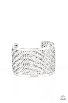 Twisted rows of silver wire layer between two flat silver bars, coalescing into a boldly stacked cuff around the wrist. Sold as one individual bracelet. Trendy Silver Cuff Bracelet For Formal Occasions, Trendy Silver Bangle For Formal Occasions, Trendy Silver Cuff Bracelet For Formal Events, Silver Metal Cuff Bangle, Trendy Silver Cuff Bangle, Slinky Silver Bangle Bracelets, Silver Stackable Cuff Bracelet Fine Jewelry, Trendy Nickel-free Silver Cuff Bracelet, Silver Slinky Bangle Bracelets