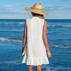 The White Ruffle Hem Mini Cover-Up Dress is a breezy essential for beach days and poolside lounging. Its ruffle hem adds a playful touch to the classic white design, providing lightweight coverage. Whether you're soaking up the sun or enjoying a leisurely stroll, this cover-up dress is the perfect companion for a day of relaxation and enjoyment. Product code: CAA05A4C003CC Beach Days, Cover Up Dress, White Design, Classic White, Ruffle Hem, Summer Wardrobe, Beach Day, Relaxation, Cover Up