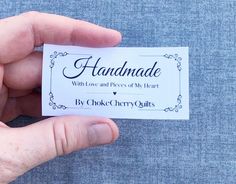 a hand holding a business card that says handmade with love and pieces of my heart