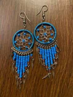 Dream Catcher Earrings  Pair of attractive Earrings Each earrings  measures about 8.05cm in length and 1.8cm in width. Dream Catcher Earrings, Dream Catcher, Jewelry Earrings Dangle, Etsy Earrings, Dangle Drop Earrings, Dangle Earrings, Etsy Accessories, Jewelry Earrings, Accessory Gift