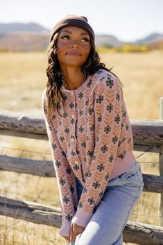 The Meadow Floral Cardigan is one you want in your closet. Featuring floral material, functional buttons, and thick material, this pretty pink cardi will bring some joy to those gloomy winter days! // paired with the on my own tie waist pants Winter Floral Print Pink Outerwear, Winter Pink Floral Print Outerwear, Winter Pink Outerwear With Floral Print, Pink Floral Print Outerwear For Fall, Pink Button-up Sweater For Fall, Cozy Pink Button-up Outerwear, Fitted Soft Knit Pink Outerwear, Fall Vintage Floral Print Cardigan, Winter Floral Print Long Sleeve Cardigan