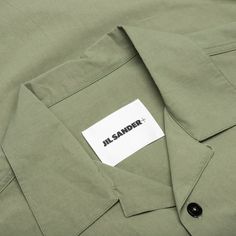 The Jil Sander Shirt is a must-have apparel silhouette for any rotation. Taking on a cotton construction, the silhouette features a button-down closure and a spread collar for a finishing touch. 100% cotton Spread collar Button-down closure Style No: J47DL0106-J45127-319 Green Cotton Shirt With Lapel Collar, Modern Button-up Shirt With Placket, Summer Shirt With Lapel Collar And Button Cuffs, Summer Shirt With Button Cuffs And Lapel Collar, Spring Cotton Camp Shirt With Button Closure, Cotton Shirt With Button Closure And Lapel Collar, Modern Shirt With Placket And Relaxed Fit, Modern Shirt With Relaxed Fit And Placket, Modern Relaxed Fit Shirt With Placket