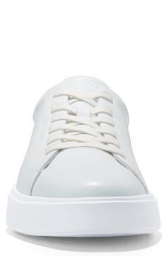 Smooth leather creates a classic sport inspired low profile sneaker that features luxe cupsole construction that adds comfort to every step. Round toe Lace-up Cushioned insole Padded cuff White sole Leather upper, manmade sole Imported Leather Sneakers With Ortholite Insole And White Sole, Classic Slip-on Sneakers With White Sole, White Leather Platform Sneakers With Cushioned Footbed, Modern Plain Toe Sports Sneakers, Lace-up Sneakers With Ortholite Insole And White Sole, Classic Lace-up Platform Sneakers With Embossed Logo, Classic Platform Sneakers With Contrast Sole, Leather Mid-top Sneakers For Light Sports, Leather Low-top Sneakers With Ortholite Insole