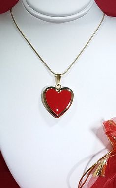 RED with Gold Heart-Shaped Photo Locket Memory Locket Measures 1 inch wide by 1 inch high Made of Stainless steel and then Gold plated. Opens up for photo insertion. A FREE Felt heart is inserted as a template to help you cut your precious photo to fit. Heart Locket is strung on a stainless steel GOLD Plated SNAKE chain 1mm wide by 45cm/ 17.7 inches long with lobster clasp. ☆ Birthday Gift ☆ Gift For her ☆ Anniversary Gift ☆ Valentine Gift ☆ Ready to ship! ☆ Free Jewelry gift box and reusable gi Red Heart Charm Necklace For Wedding, Red Festive Jewelry For Gift Giving, Red Festive Jewelry For Gifts, Red Heart Charm Jewelry For Wedding, Red Heart-shaped Jewelry For Gifts, Red Necklaces For Valentine's Day Festive Occasions, Red Jewelry With Heart Charm For Wedding, Red Necklace For Valentine's Day Festivities, Valentine's Day Festive Heart-shaped Jewelry